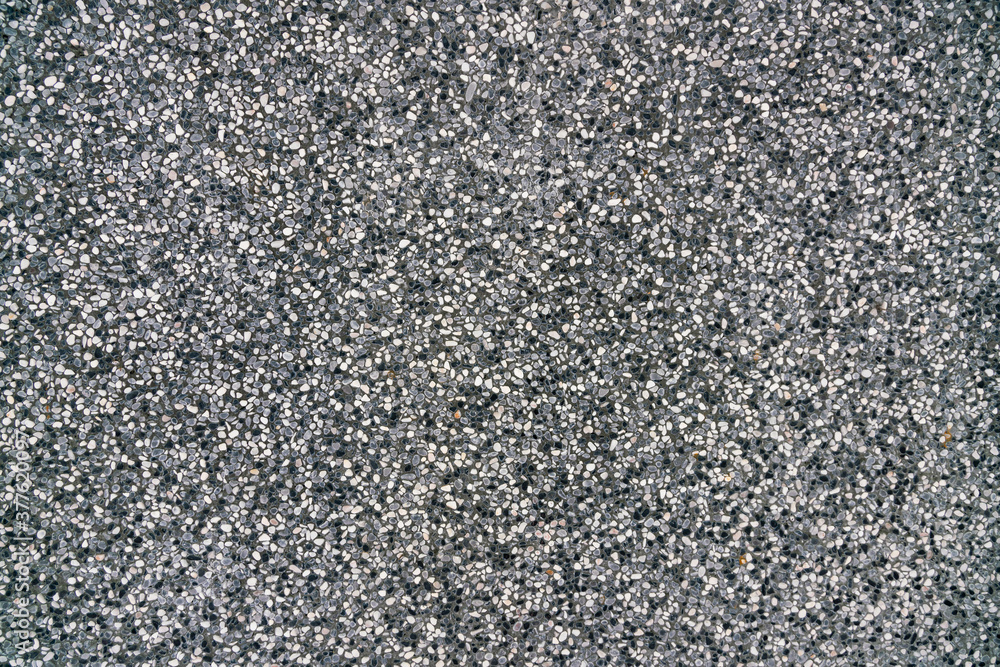 Small black rock wall background and texture Small black rock wall background and texture