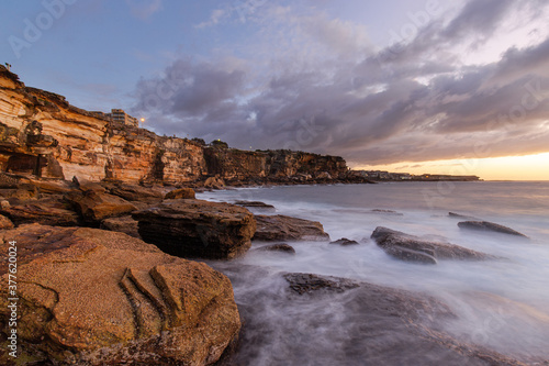 Coogee rock cliff view during sunrise.