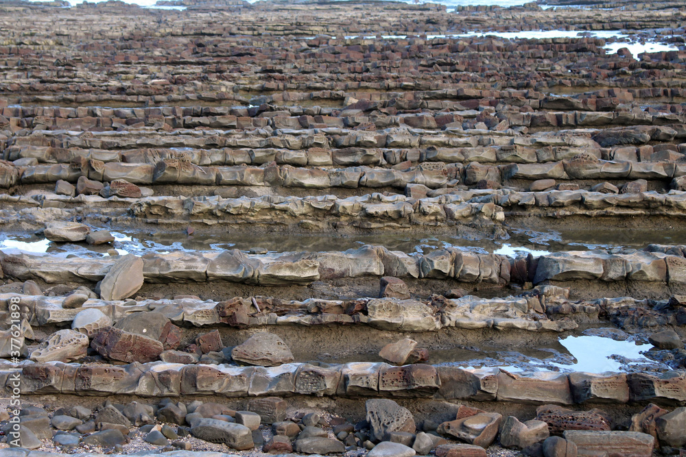 Horizon of rock formation or Devil's washboard in Aoshima, Miyazaki