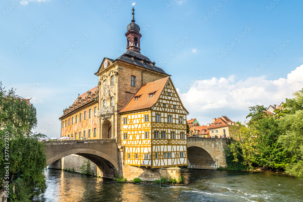 Panoramic view at the Old Town hall with bridge over Regnitz river in Bamberg, Germany