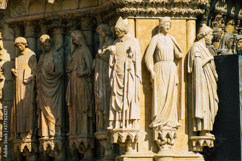 View of the exterior facade of the Roman Catholic Notre Dame de Reims Cathedral, a historical monument in the Grand Est region of France and one of the oldest in Europe

