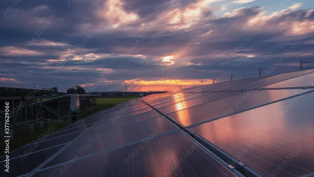 Time-lapse 4K large industrial Solar Energy Farm producing concentrated solar power day to night.Green energy concept.
