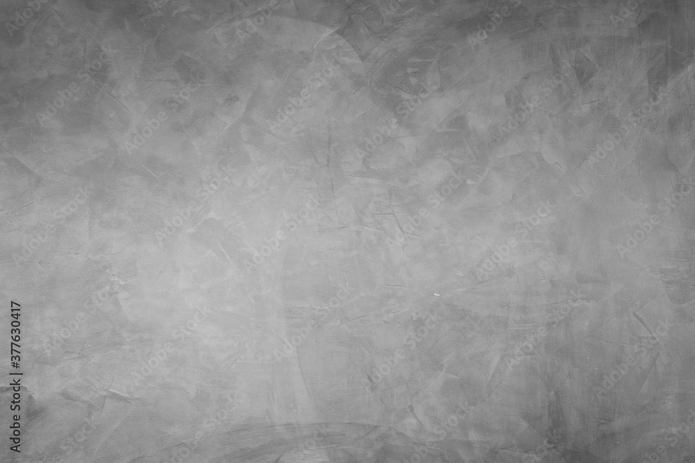 Naklejka premium Abstract background of modern loft cement texture. The gray concrete wall has some scratch without a fixed pattern. Can be used in graphic design and for creating various backgrounds.