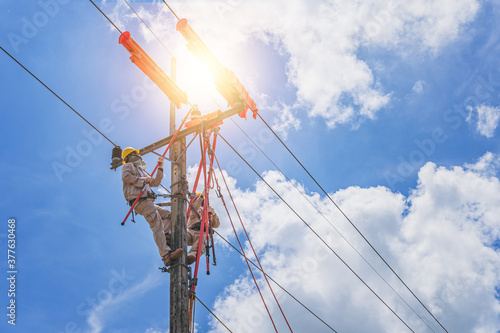 The lineman used tie stick to carve the tie wire used to wrap the electrical wires attached to the damaged high voltage insulator. In order to prepare to replace the damaged equipment