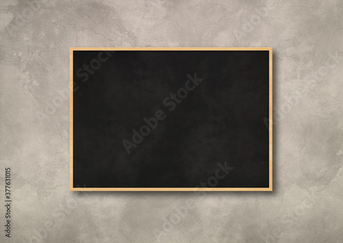 Traditional black board isolated on a concrete background