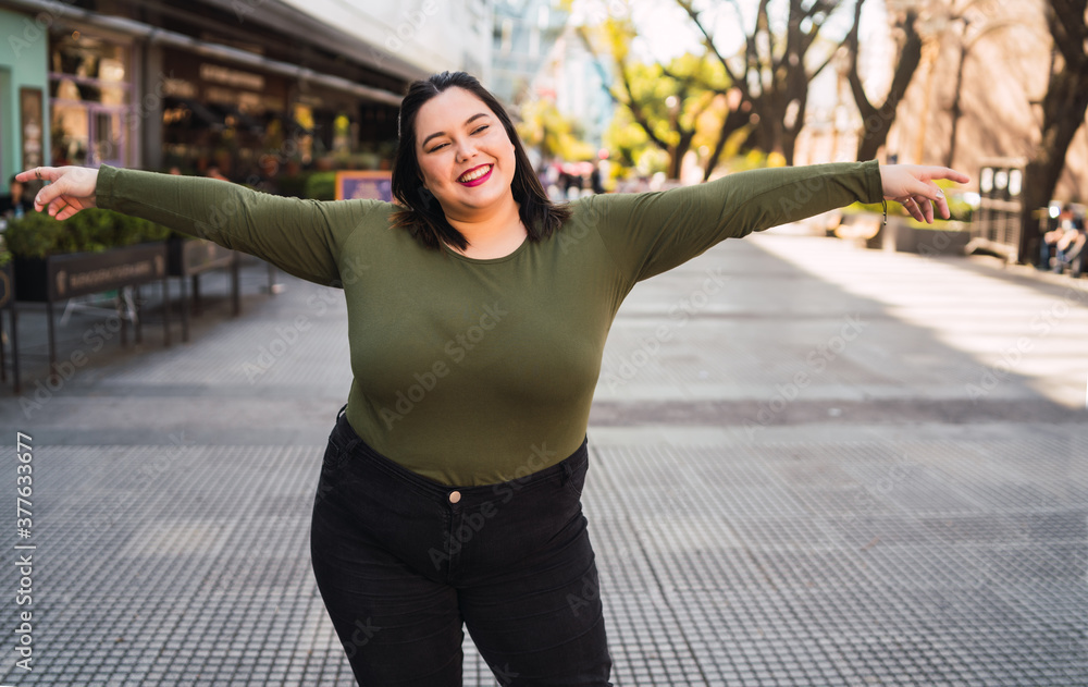 Portrait of young plus size woman. Portrait of young plus size woman.