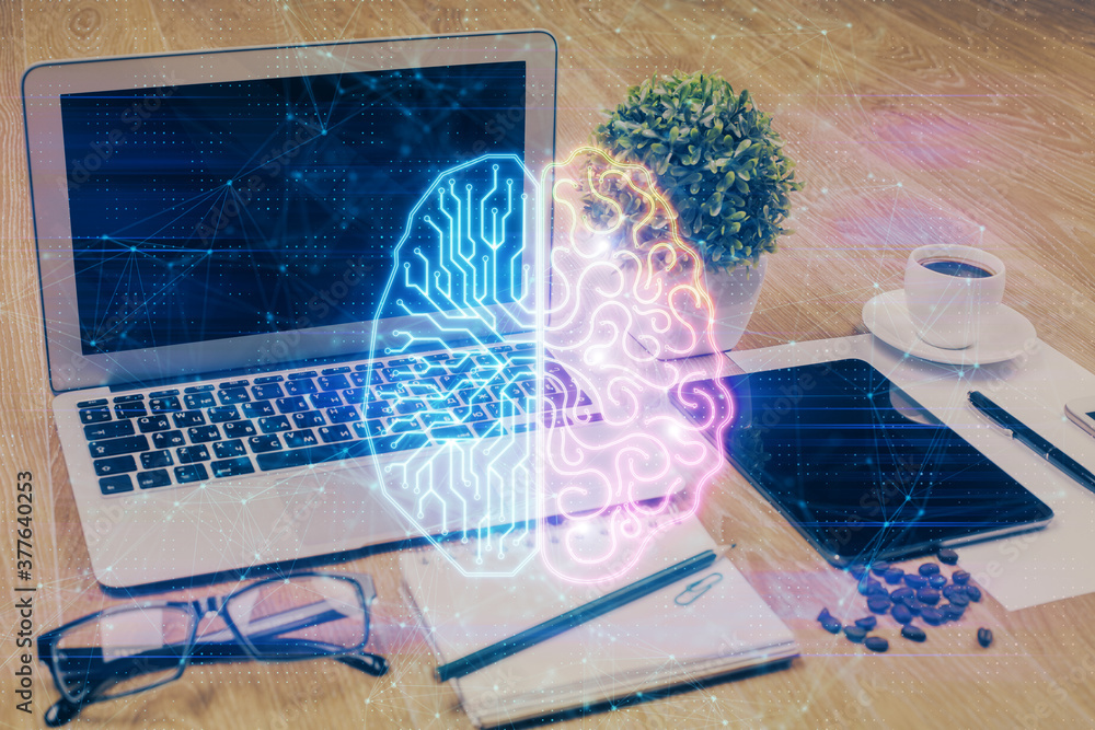 Double exposure of desktop with computer and brain drawing hologram. Artificial intelligence concept. Double exposure of desktop with computer and brain drawing hologram. Artificial intelligence concept.