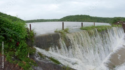 View of the overflowing check dam in Vadsar Lake at Wankaner, Gujarat, India	 photo