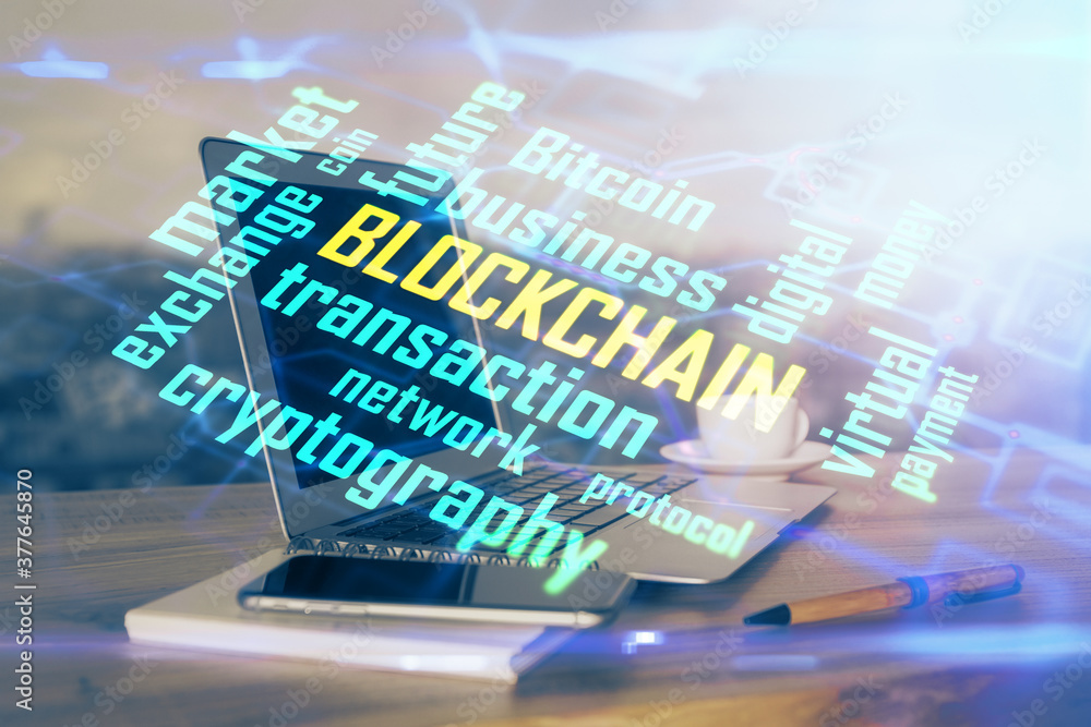 Double exposure of blockchain theme hologram and table with computer background. Concept of bitcoin crypto currency. Double exposure of blockchain theme hologram and table with computer background. Concept of bitcoin crypto currency.