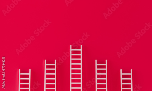 Ladder collection on red wall background. success concept with copy spaces for text. 3d rendering.