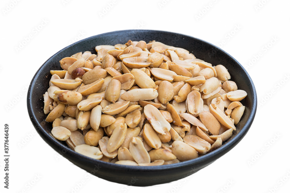 Salted roasted peanuts in a black bowl