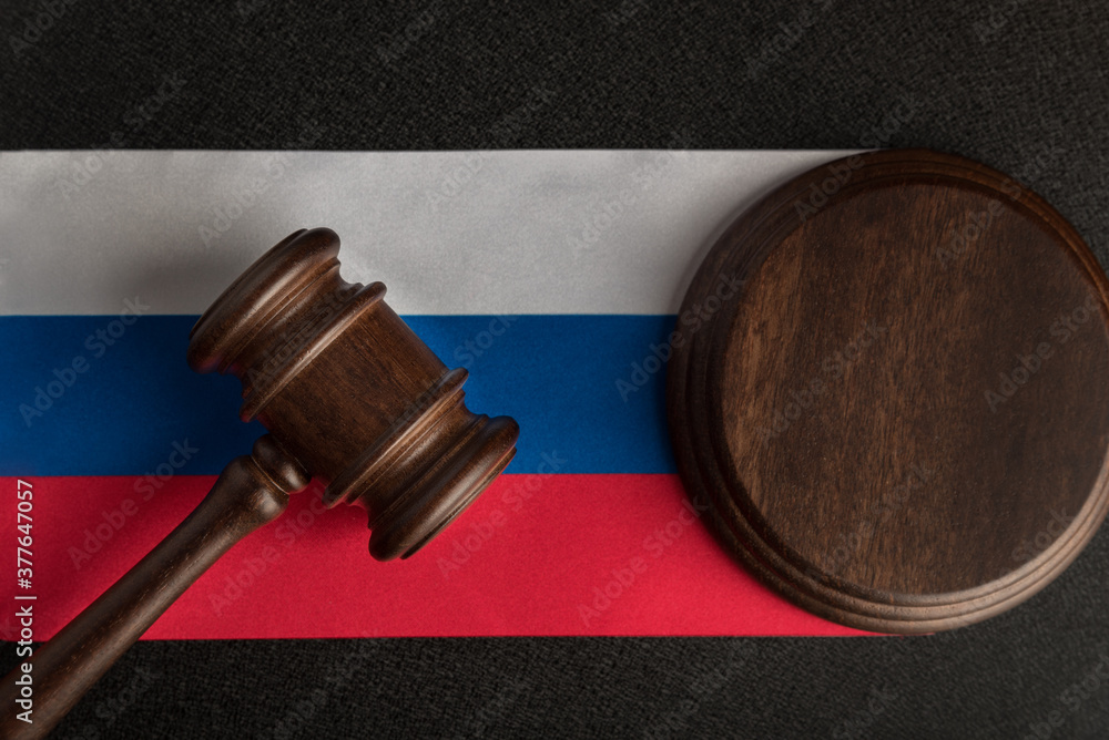 Justice gavel on Russia flag. Law and justice in Russian Federation. Rights of citizens