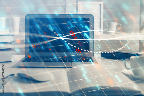 Stock market chart hologram drawn on personal computer background. Double exposure. Concept of investment.