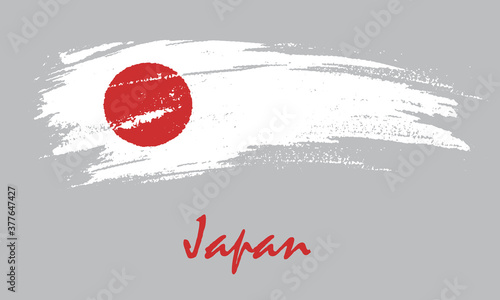 Japanese flag brush drawing in grunge style.
