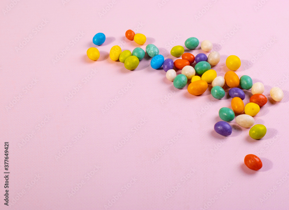 sweet bright colour candies on pink sweet bright colour candies on pink