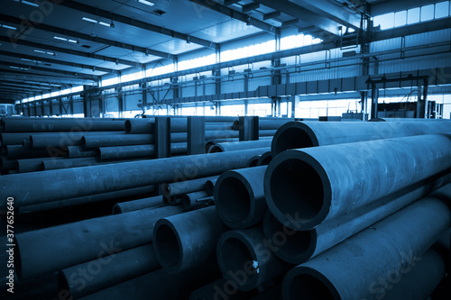 The steel pipes are stacked in the workshop warehouse © onlyyouqj