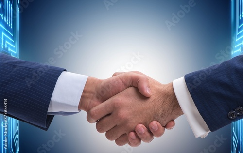 The business cooperation concept with two hands shaking