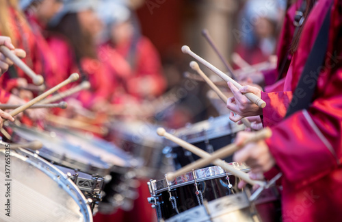 close-up of hands playing the drum during easter