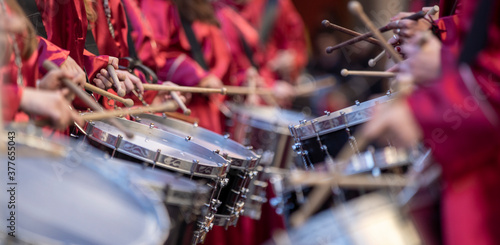 close-up of hands playing the drum during easter photo