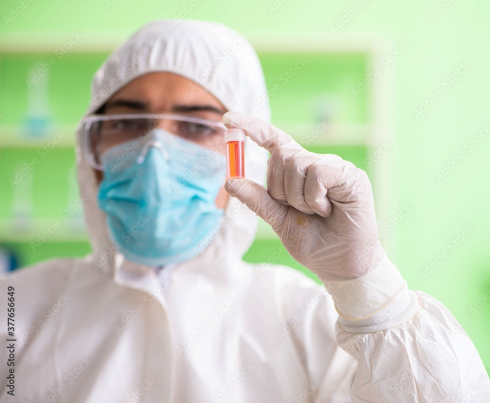 Chemist working in the lab on new experiment Chemist working in the lab on new experiment