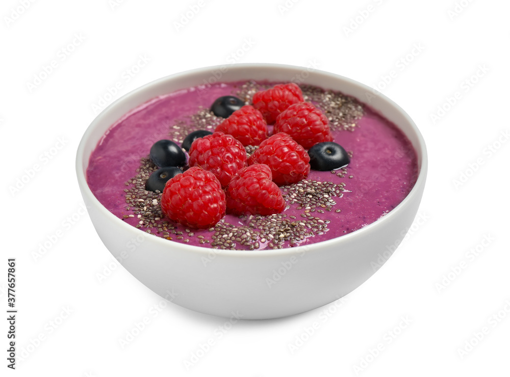 Healthy breakfast with delicious acai smoothie and fruits in bowl isolated on white