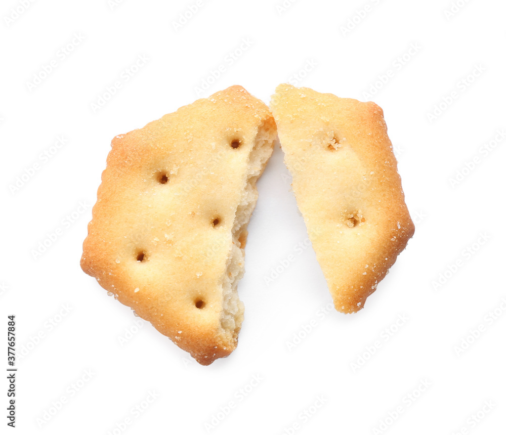Broken delicious crispy cracker isolated on white