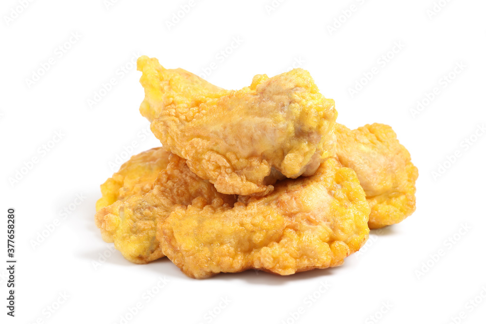 Tasty deep fried chicken pieces isolated on white Tasty deep fried chicken pieces isolated on white