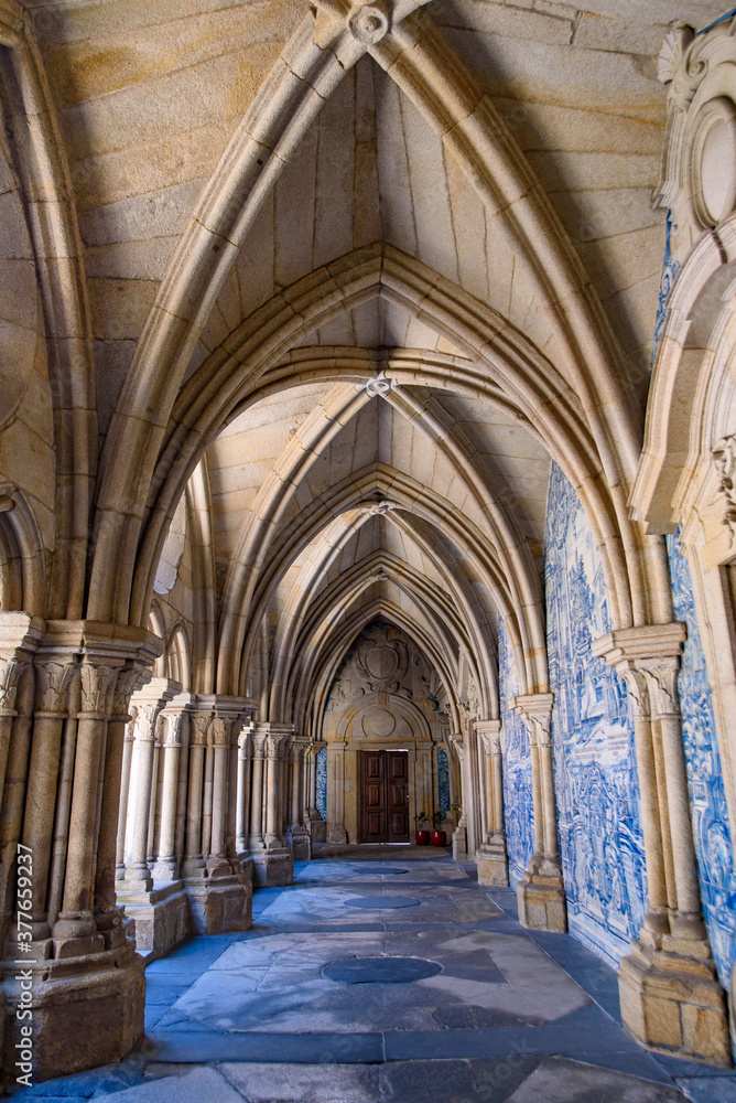 Cloister decorated with Azulejo mural in Porto Cathedral, a Catholic church in Porto, Portugal