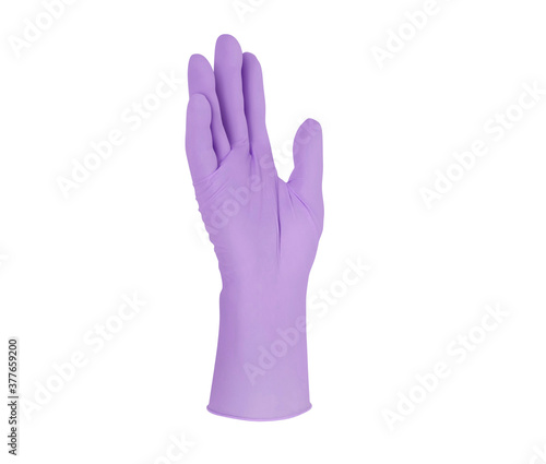 Medical nitrile gloves.Two violet surgical gloves isolated on white background with hands. Rubber glove manufacturing, human hand is wearing a latex glove. Doctor or nurse putting on protective gloves