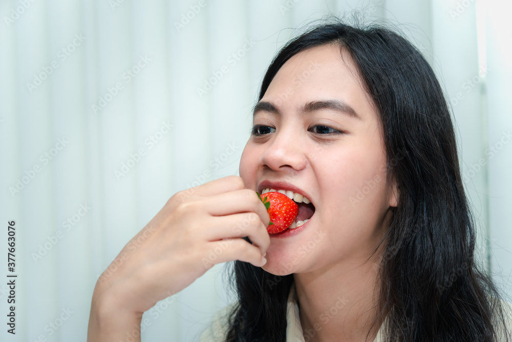 Woman eat strawberry red berry fruit sweet juicy Woman eat strawberry red berry fruit sweet juicy
