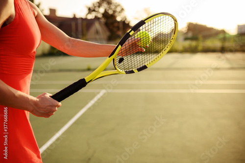 Female tennis player with racket and ball © Nomad_Soul