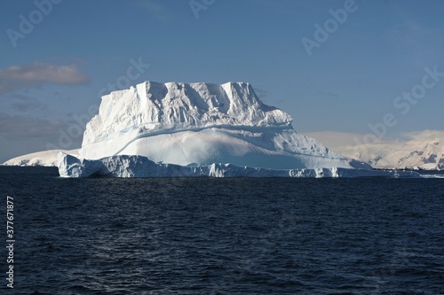 Large floating mass of ice detached from a glacier or ice sheet and carried out to the sea. Antarctic peninsula.South ocean.Antarctica.