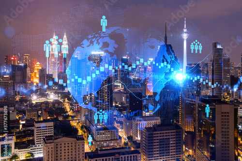 Photography Glowing Social media icons on night panoramic city view of Kuala Lumpur, Malaysia, Asia