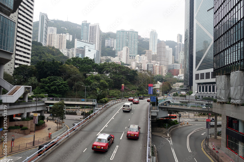 Glass skyscrapers in Central District of Hong Kong. Urban skyline of corporate and financial buildings at Hong Kong Glass skyscrapers in Central District of Hong Kong. Urban skyline of corporate and financial buildings at Hong Kong