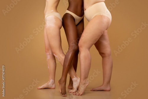 Valokuva Tree women with different race and body sizes posing in underwear, cropped