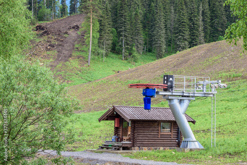 Lift with iron poles and cables for lifting people on the mountain.