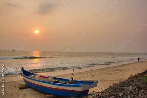 Malvan sea beach with boat, Maharashtra, India © santosh