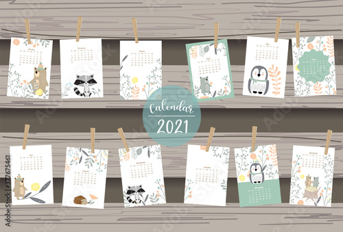 Cute woodland calendar 2021 with bear, skunk, penguin, leaves for children, kid, baby