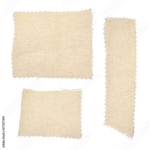 Canvastavla Square, rectangular long pieces of canvas, cut burlap fabric, patch for clothes, dry garbage, scraps of fabric, background for text from fabric isolated on a white background