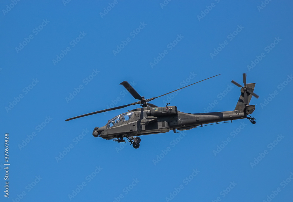 An AH-64D Apache Longbow attack helicopter An AH-64D Apache Longbow attack helicopter