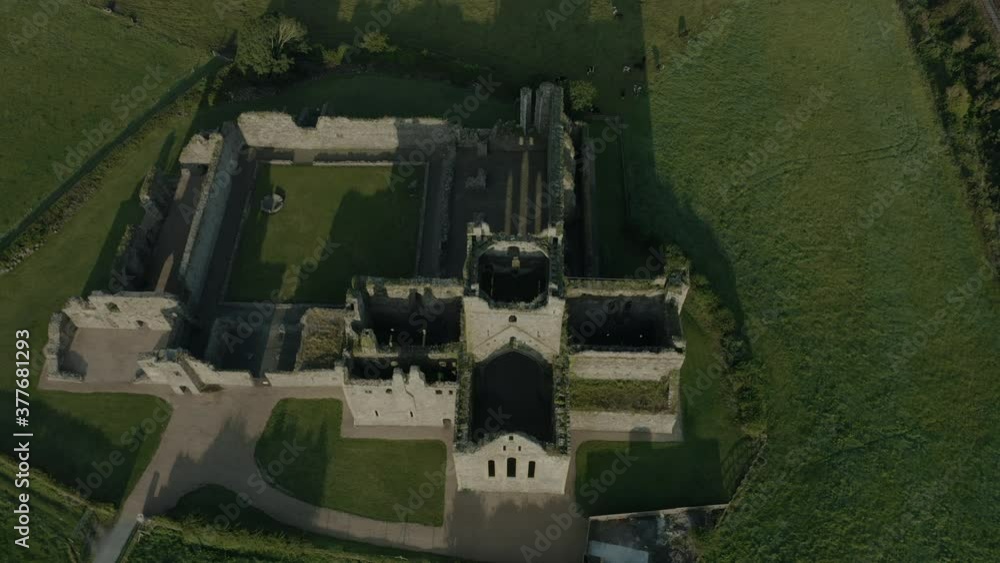 Aerial view, tilt down, Dunbrody Abbey is a former Cistercian monastery in County Wexford, Ireland. The cross-shaped church was built in the 13th century, and the tower was added in the 15th century. Aerial view, tilt down, Dunbrody Abbey is a former Cistercian monastery in County Wexford, Ireland. The cross-shaped church was built in the 13th century, and the tower was added in the 15th century.