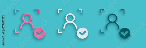 Paper cut Face recognition with check mark icon isolated on blue background. Face identification scanner icon. Facial id. Cyber security concept. Paper art style. Vector.