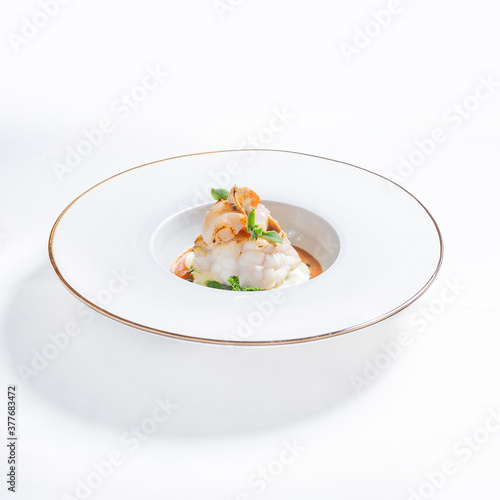 Luxurious dish with fish and seafood