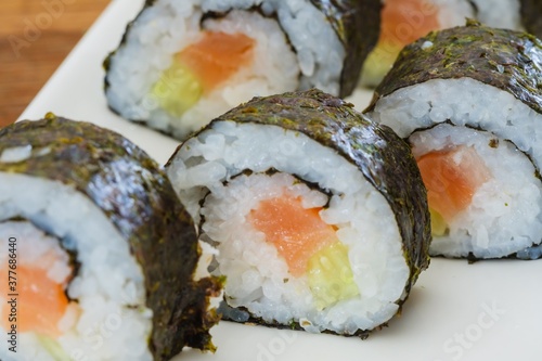 Sushi roll seafood rice fish, prepared restaurant.