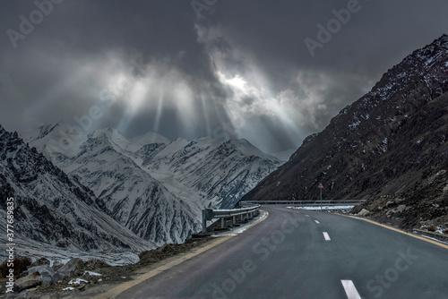 sun beams on the snow mountains of khunjrab pass kkh, gojal , hunza, nagar , northern areas of Pakistan  photo