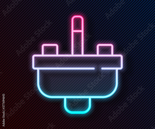Glowing neon line Washbasin with water tap icon isolated on black background. Vector.