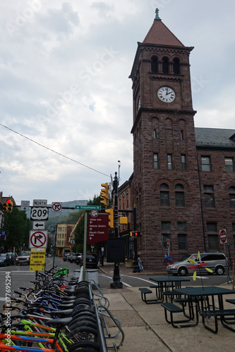 Street intersection in small town with stunning example of red brick heritage architecture. photo