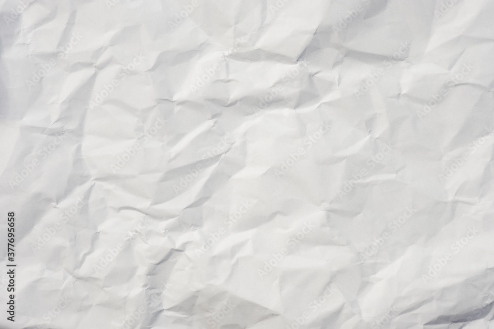 Closeup of white crumpled paper for texture background. Closeup of white crumpled paper for texture background.