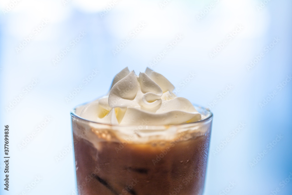 Iced coffee with whipped cream and sprinkle with almonds Iced coffee with whipped cream and sprinkle with almonds