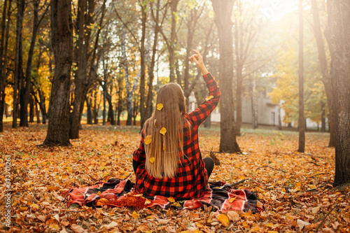 Fall its coming  Hello autumn. Beautiful blond girl on autumn background. Stylish young lady in park. Beautiful blond girl outdoors
